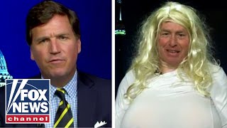 Tucker goes one-on-one with commentator who wore giant prosthetic breasts to make a point