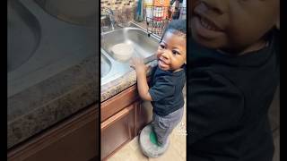 Just casually washing dishes… 😂😂 #blackbabygoals
