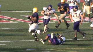 Ypsilanti RB rushes for TD vs. Bay City Central in scrimmage at Westland Glenn