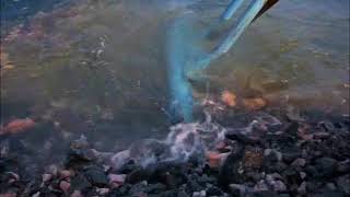 Dredging of rocks at sea