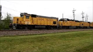 UPY 709 leads the Troy Grove sub local west on the Geneva sub in Geneva IL