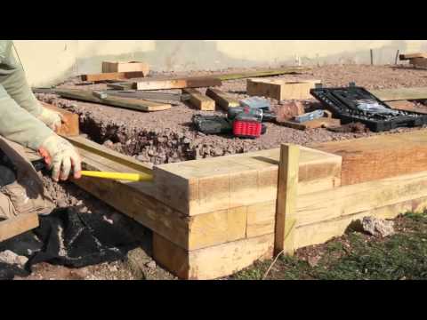 Building a Wall with Oak Sleepers | TRC Garden Building a Wall with Oak Sleepers | TRC Garden