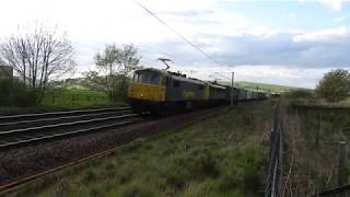 86632 and 86614 passing Thankerton with 4M11 the 1814 Coatbridge FLT to Basford Hall on Monday 29 Ap