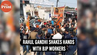 Rahul Gandhi shakes hands with BJP workers protesting against his ‘yatra’