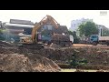 Caterpillar Excavator Loading Mercedes & MAN Trucks