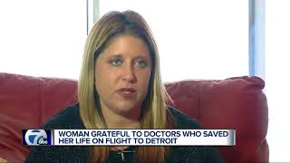 Doctors save woman's life, perform CPR for hours on flight to Detroit