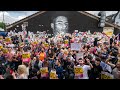 Hundreds take the knee in front of Marcus Rashford mural