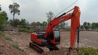 Doosan Dx140Lca ทำงานชั่วโมง ลอกนาเสริมคันกำแพง