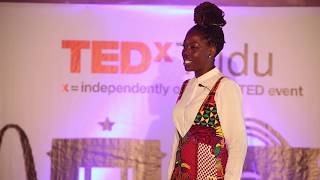 Homecoming, The Identity of an African American in Africa | Ashley Milton | TEDxTudu