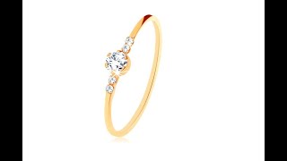 Jewelry – Ring made of yellow 9K gold, round clear zircon, tiny zircons on sides