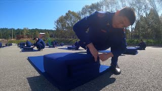 Forest firefighters compete in quilt-folding contest in NE China