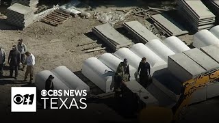 Man pinned under burial vault in Dallas dies