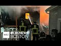 Fire rips through East Boston home, forcing firefighters out