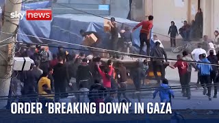 Palestinians mob aid truck as order breaks down in Gaza | Israel-Hamas war