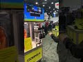 man vs. machine at cognex booth at automate 2023