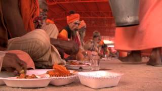 Varanasi Bhandara - Sadhus taking the devotional taste