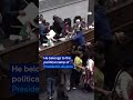 Scuffles break out between lawmakers in parliament | DW News