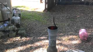 Camp stove with new exhaust nozzle and boiler