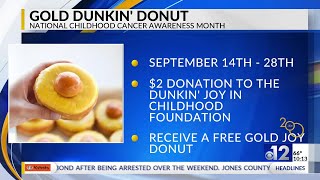 Gold Dunkin’ donut helps support children battling cancer