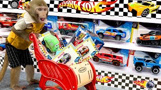 Baby monkey Bim Bim goes to the supermarket to buy a Hot Wheel car to play races with ducklings