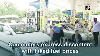 Commuters express discontent with hiked fuel prices