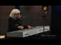 Lady Gaga plays the keyboard