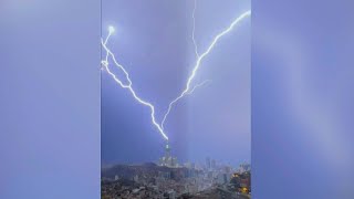 Lightning strikes in Saudi holy city of Mecca as rain floods its streets | AFP
