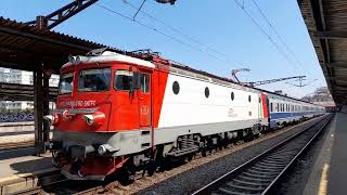 An IRN train pulled by the 060-EA #008 locomotive departs from Northern Railway Station Bucharest