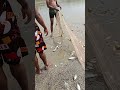 village fishing in lake