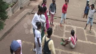 Ethiopian children playing a jump-rope game. Stock Footage