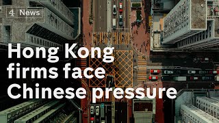 Hong Kong: Firms under pressure from China to toe government line