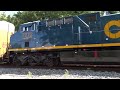 two freshly painted cm44ac rebuilds pull csx autorack train