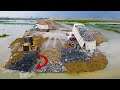 Good Build Road in Lake By Modern Machinery bulldozer shantui pushing stone and land in water