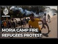 Greek police fire tear gas as refugees demand to leave Lesbos