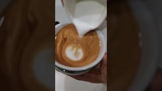 pouring milk with paper cup