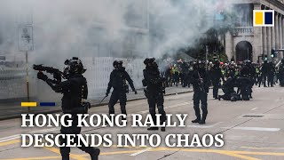 Tear gas and arrests as Hong Kong rally for universal suffrage descends into chaos