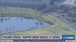 Teacher gets trapped under vehicle at Pasco school, suffers critical injuries, officials say