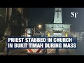 Priest stabbed at church in Singapore during mass