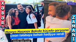 Məşhur bloger Hüseyn Həsənov Bakıda küçədə qarşısına çıxan tələbəyə bahalı hədiyyə verdi