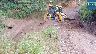 Connecting One Hilly Village with Another-Road Construction-Backhoe Loader