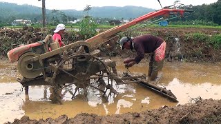 Tractors Leveling Corners of Rice Fields