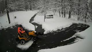 Cub Cadet XT1-LT42 with All Season Plow Blade plowing 4 inches of semi wet snow.