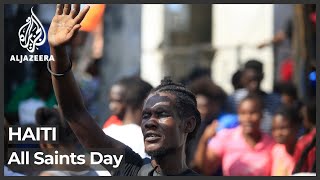 Haiti 'All Saints Day': Catholic and voodoo believers unite in worship