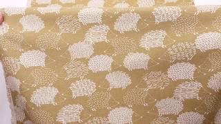 natural color Robert Kaufman cotton flax fabric with hedgehogs