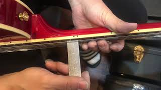 Adjusting the height of the bridge or truss rod