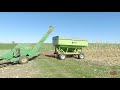 john deere 300 corn husker picking corn