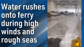 Water floods onto Washington ferry during rough seas and high winds