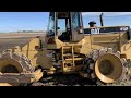 How to operate a construction packer (Cat 815F)