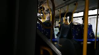 Articulated trolleybus Škoda 27Tr rides through stop \