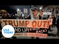 Protesters march in front of Chicago's Trump tower | USA TODAY